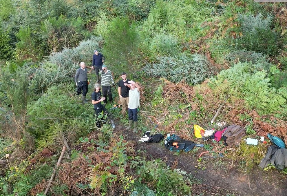 Group of people on a hillside.